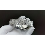 Sunday Calendar series women's watch, black dial, silver bezel, 36mm, with diamond-set silver President-style bracelet.